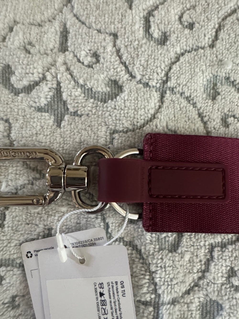 NWT, Lululemon “ never lost  keychain in wine./ pink logo . - Picture 4 of 5